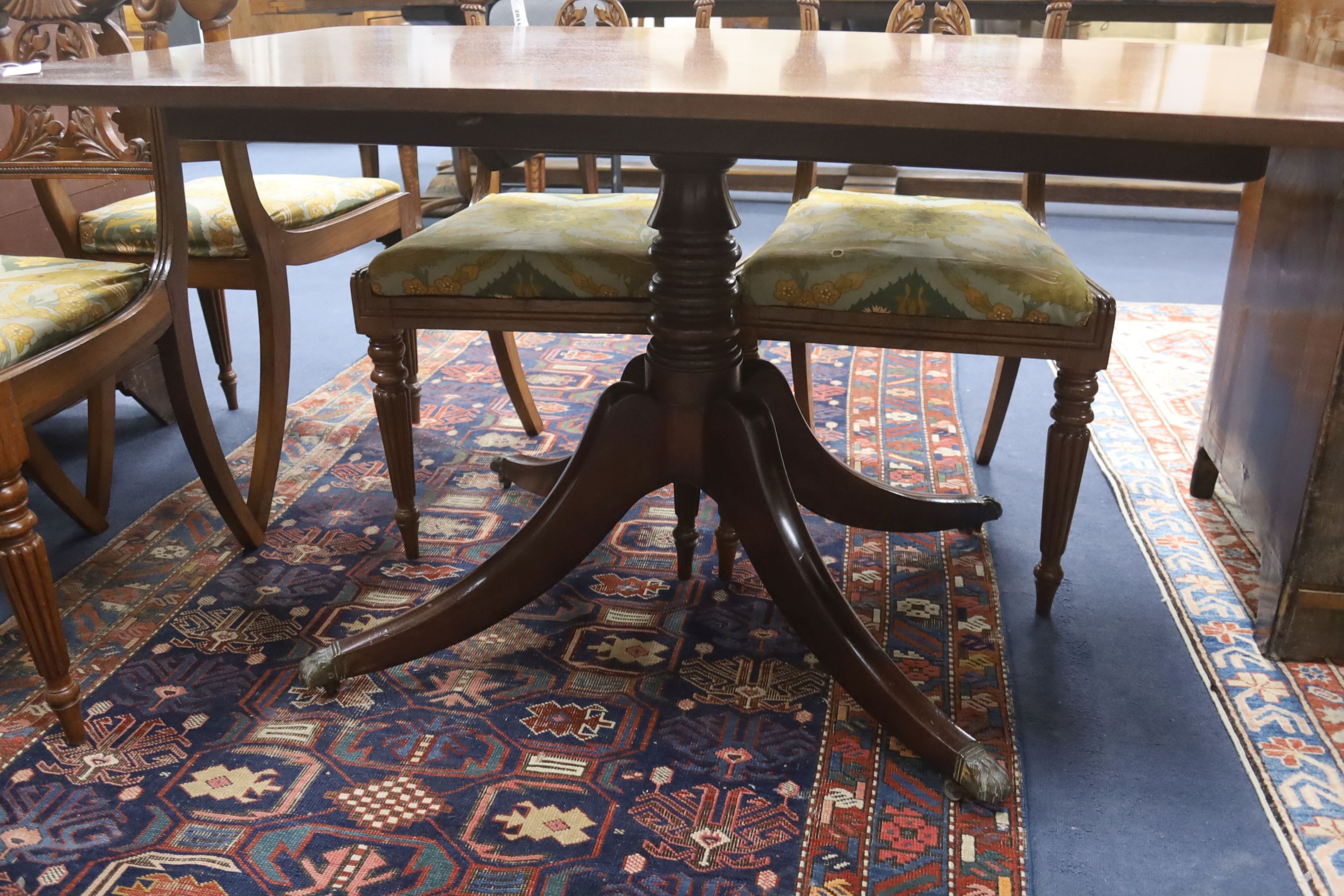 A Regency rectangular mahogany tilt top dining table, width 130cm, depth 80cm, height 72cm